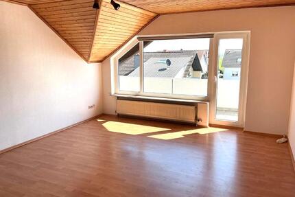 Helle 2 Zimmerwohnung in 65428 Bauschheim mit Stellplatz