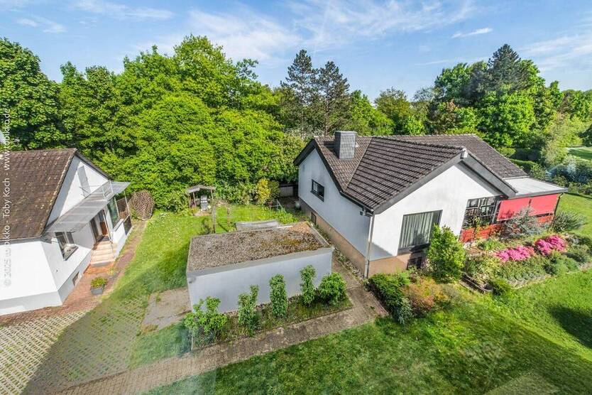 Neu-Isenburg: 1 Mehrgenerationenhaus, 2 Einfamilienhäuser und eine Bauoption mit Bauvorbescheid