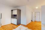 Teilmöbliertes 1-Zimmer-Apartment im Neubau zimmer