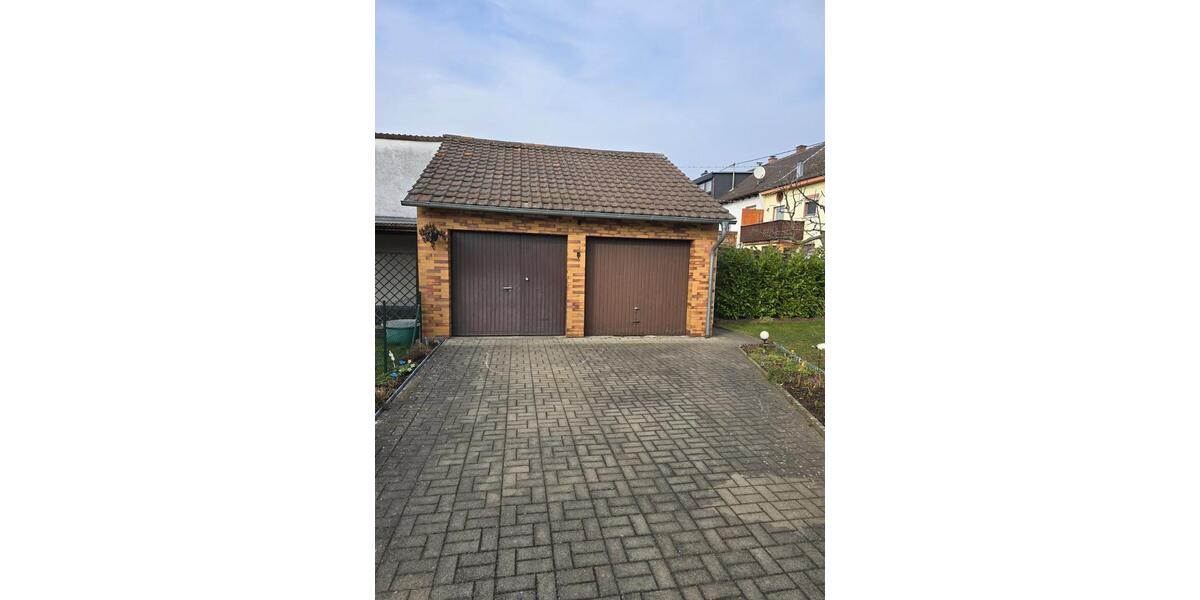 3-Zimmer-Eigentumswohnung mit Gartenanteil und Garage 3 zimmer