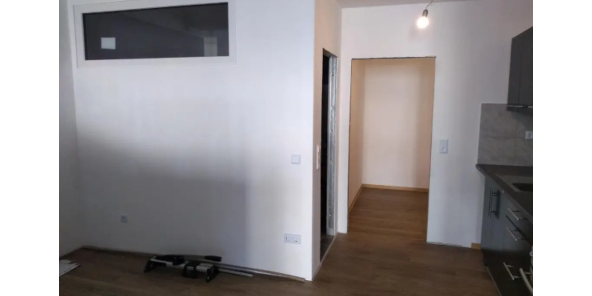 Moderne, geräumige Studio-Wohnung mit Einbauküche zimmer