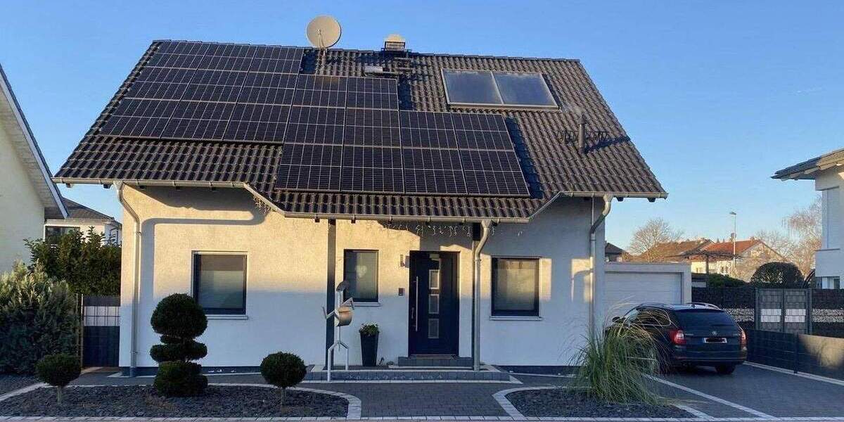 RESERVIERT - Modernes, freistehendes Einfamilienhaus in Lage von Bürstadt - ideal für Familien 5 zimmer