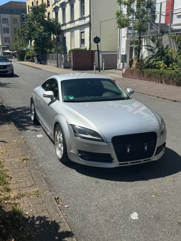 TT