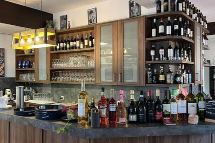 Stilvolle Vinothek mit Gastronomiebereich in zentraler Lage zimmer